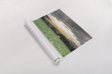 Laying in the Flowers by Nathan Larson. shown as a rolled paper print. Available as archival giclee rolled canvas, fine art paper, or poster print. SKU 71622i.