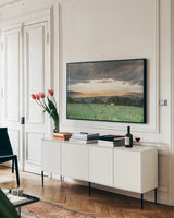 Laying in the Flowers by Nathan Larson. shown as a framed stretched canvas in a living room above a console. Available as a archival giclee rolled canvas, fine art paper, or poster print. SKU 71622i.