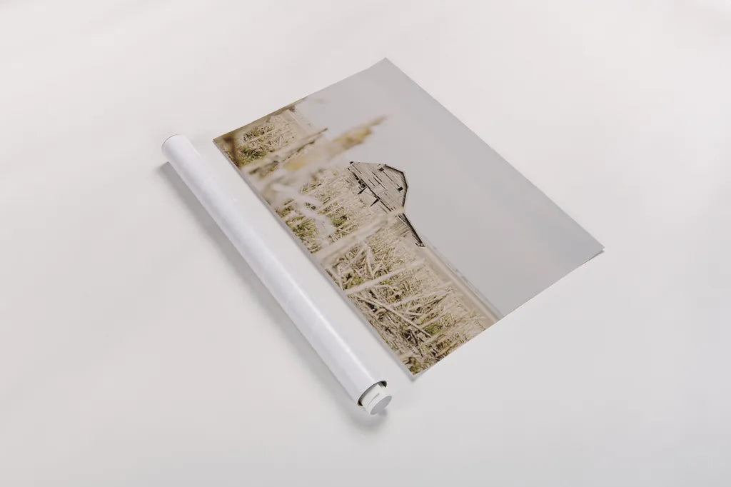 Leaning Barn Field I by Nathan Larson. shown as a rolled paper print. Available as archival giclee rolled canvas, fine art paper, or poster print. SKU 86060i.