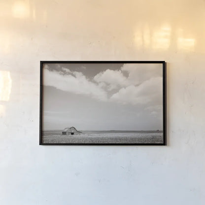 Leaning Barn Field III by Nathan Larson. shown as a paper print in a black flame. Available as a archival giclee rolled canvas, fine art paper, or poster print. SKU 86073i.