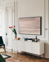 Light House by Nathan Larson. shown as a framed stretched canvas in a living room above a console. Available as a archival giclee rolled canvas, fine art paper, or poster print. SKU 71431i.