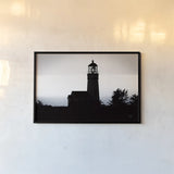 Lighthouse Forest by Nathan Larson. shown as a paper print in a black flame. Available as a archival giclee rolled canvas, fine art paper, or poster print. SKU 90174i.