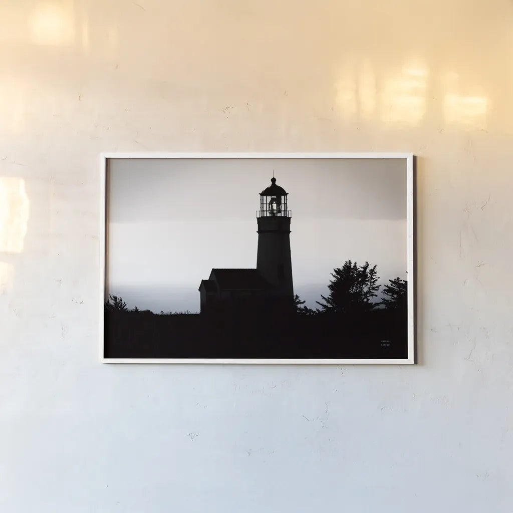 Lighthouse Forest by Nathan Larson. shown as a paper print in a white frame. Available as a archival giclee rolled canvas, fine art paper, or poster print. SKU 90174i.