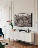 Lighthouse Keepers by Nathan Larson. shown as a framed stretched canvas in a living room above a console. Available as a archival giclee rolled canvas, fine art paper, or poster print. SKU 89460i.