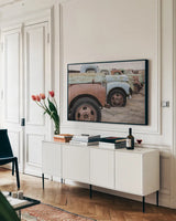 Line Up by Nathan Larson. shown as a framed stretched canvas in a living room above a console. Available as a archival giclee rolled canvas, fine art paper, or poster print. SKU 87721i.