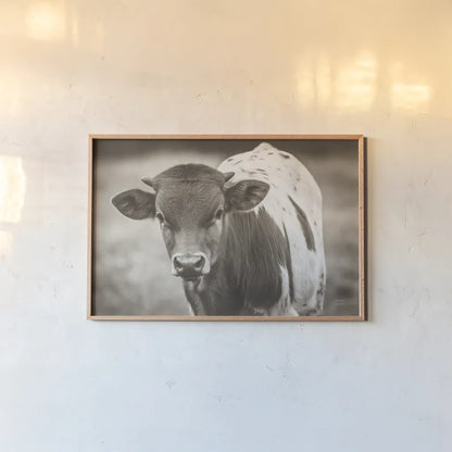 Little Longhorn Sepia by Nathan Larson. shown as a paper print in a natural frame. Available as a archival giclee rolled canvas, fine art paper, or poster print. SKU 92467i.
