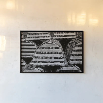 Lobster Traps by Nathan Larson. shown as a paper print in a black flame. Available as a archival giclee rolled canvas, fine art paper, or poster print. SKU 102032i.