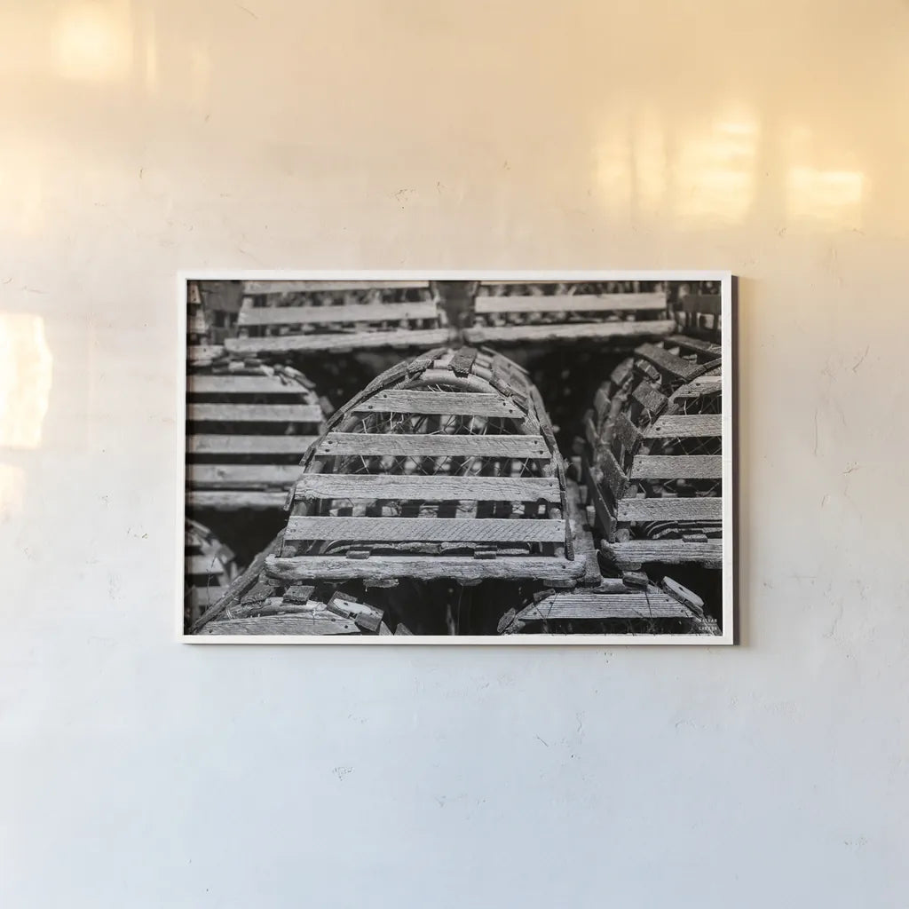 Lobster Traps by Nathan Larson. shown as a paper print in a white frame. Available as a archival giclee rolled canvas, fine art paper, or poster print. SKU 102032i.