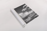 Long Way to Ride BW by Nathan Larson. shown as a rolled paper print. Available as archival giclee rolled canvas, fine art paper, or poster print. SKU 79409h.