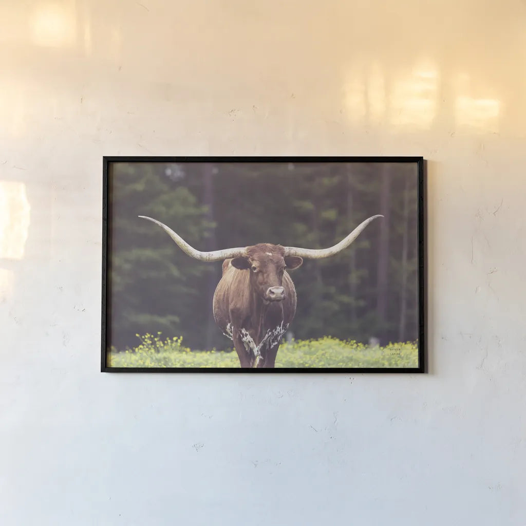 Longhorn Flowers by Nathan Larson. shown as a paper print in a black flame. Available as a archival giclee rolled canvas, fine art paper, or poster print. SKU 91518i.