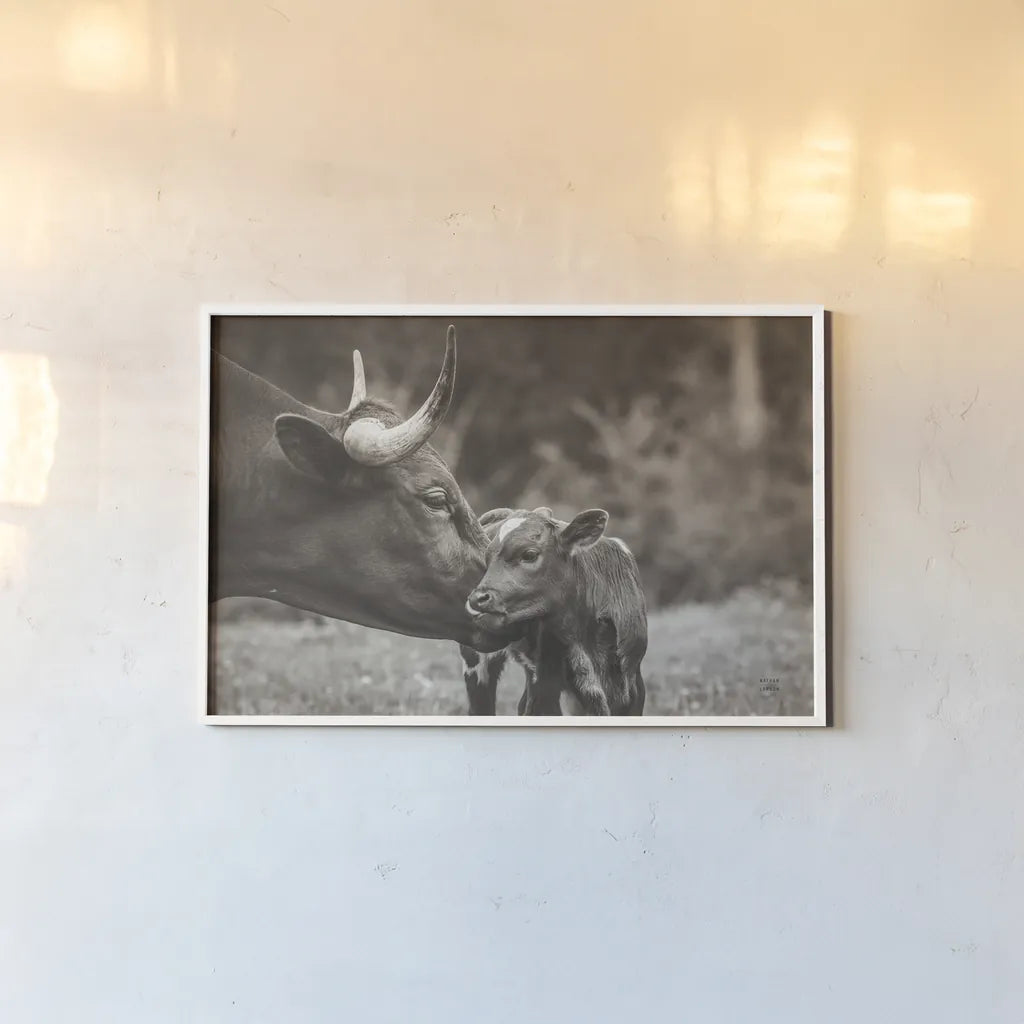 Longhorn Kiss Sepia by Nathan Larson. shown as a paper print in a white frame. Available as a archival giclee rolled canvas, fine art paper, or poster print. SKU 91377i.