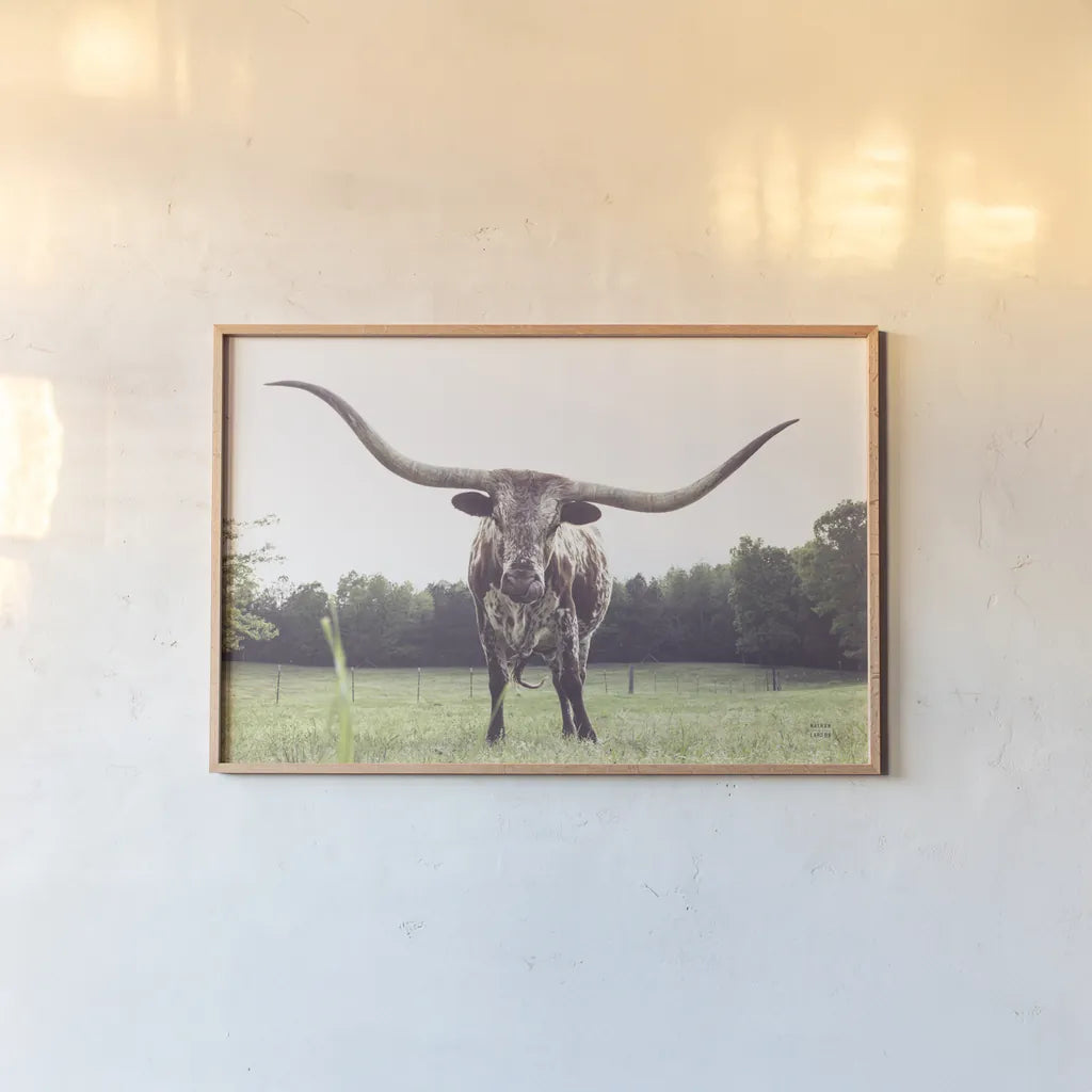 Longhorn Last Call by Nathan Larson. shown as a paper print in a natural frame. Available as a archival giclee rolled canvas, fine art paper, or poster print. SKU 91367i.