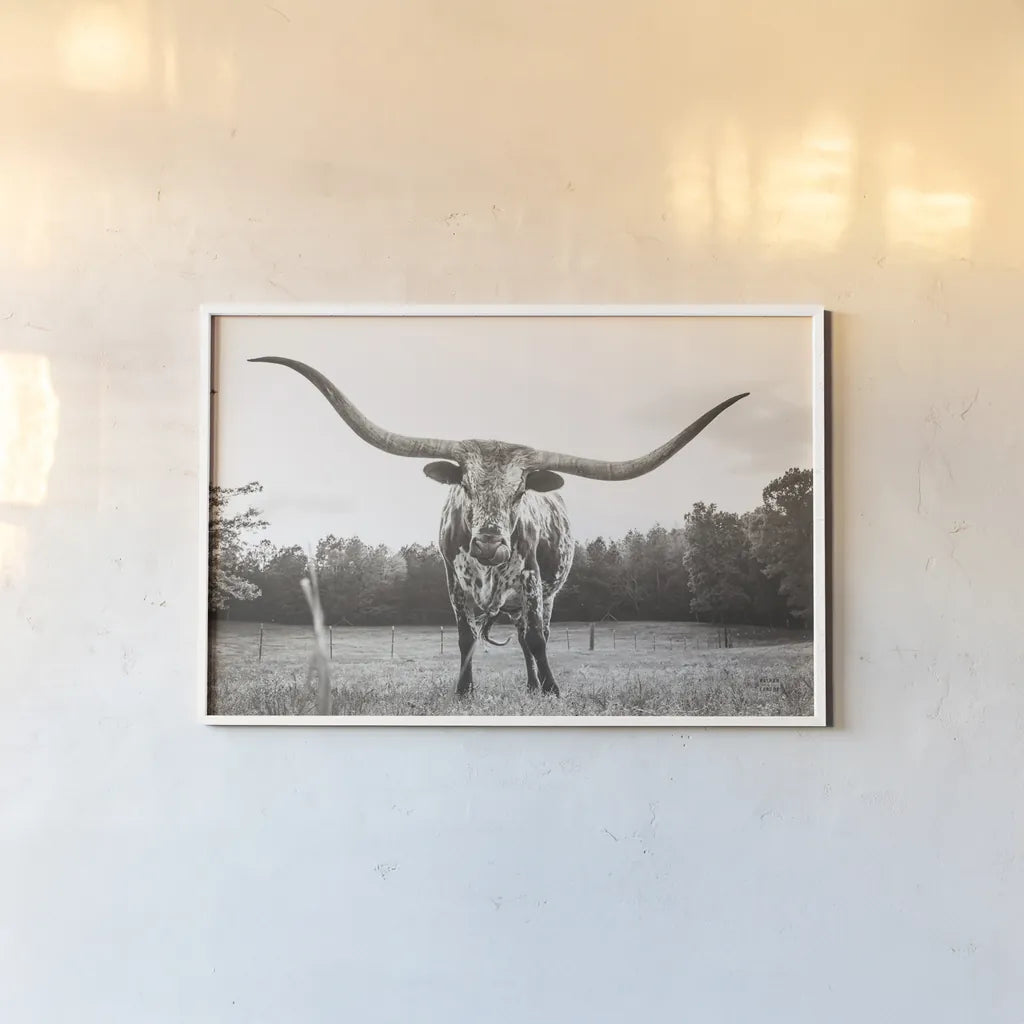 Longhorn Last Call BW by Nathan Larson. shown as a paper print in a white frame. Available as a archival giclee rolled canvas, fine art paper, or poster print. SKU 91368i.