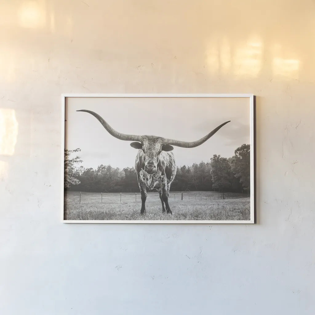 Longhorn Last Call BW No Tail by Nathan Larson. shown as a paper print in a white frame. Available as a archival giclee rolled canvas, fine art paper, or poster print. SKU 91370i.