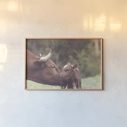 Longhorn Pairing by Nathan Larson. shown as a paper print in a natural frame. Available as a archival giclee rolled canvas, fine art paper, or poster print. SKU 91898i.