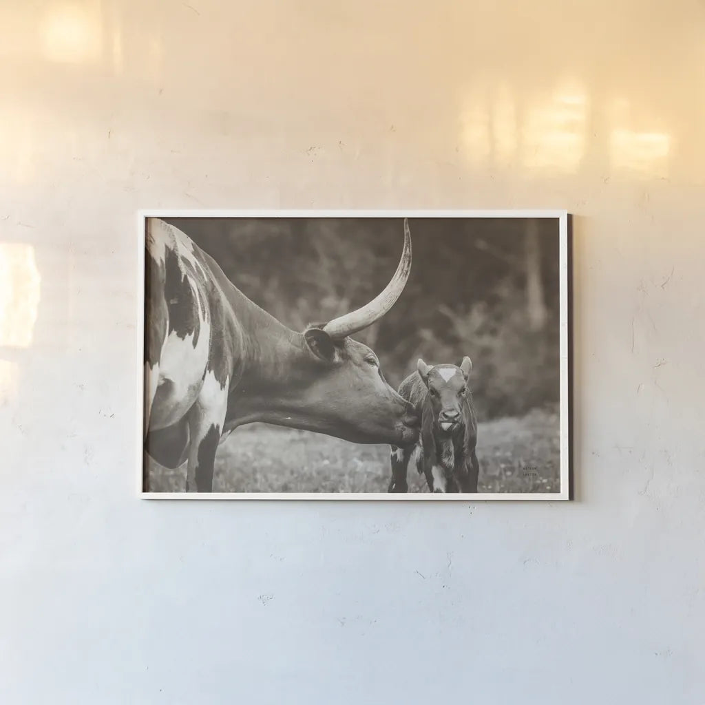 Longhorn Pasture Pair Sepia by Nathan Larson. shown as a paper print in a white frame. Available as a archival giclee rolled canvas, fine art paper, or poster print. SKU 93357i.