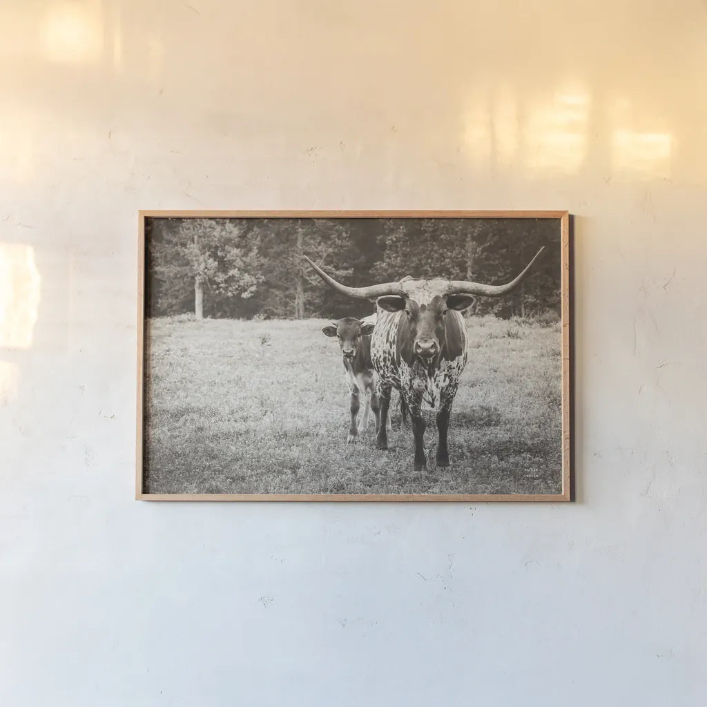 Longhorn Protection Sepia by Nathan Larson. shown as a paper print in a natural frame. Available as a archival giclee rolled canvas, fine art paper, or poster print. SKU 91521i.