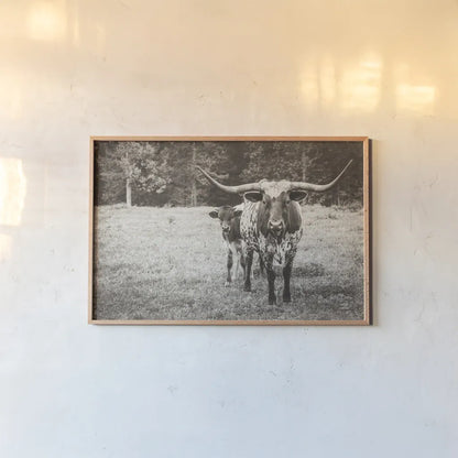 Longhorn Protection Sepia by Nathan Larson. shown as a paper print in a natural frame. Available as a archival giclee rolled canvas, fine art paper, or poster print. SKU 91521i.