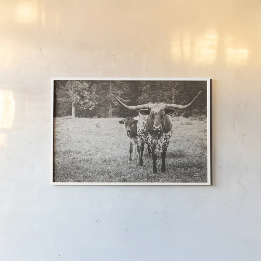 Longhorn Protection Sepia by Nathan Larson. shown as a paper print in a white frame. Available as a archival giclee rolled canvas, fine art paper, or poster print. SKU 91521i.