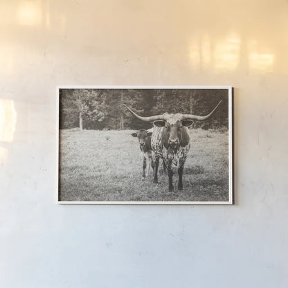 Longhorn Protection Sepia by Nathan Larson. shown as a paper print in a white frame. Available as a archival giclee rolled canvas, fine art paper, or poster print. SKU 91521i.