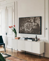 Longhorn Twist Sepia by Nathan Larson. shown as a framed stretched canvas in a living room above a console. Available as a archival giclee rolled canvas, fine art paper, or poster print. SKU 93364i.