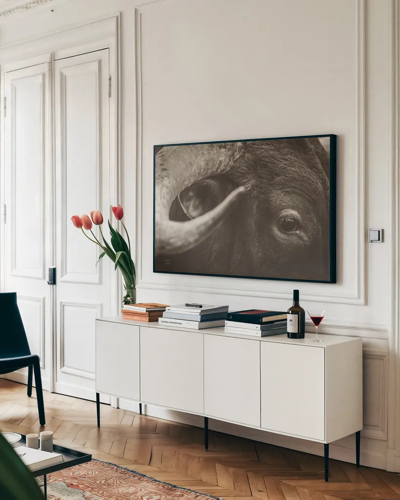 Longhorn Watch Sepia by Nathan Larson. shown as a framed stretched canvas in a living room above a console. Available as a archival giclee rolled canvas, fine art paper, or poster print. SKU 92324i.
