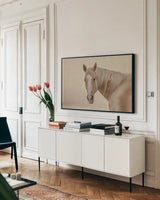 Looking Back by Nathan Larson. shown as a framed stretched canvas in a living room above a console. Available as a archival giclee rolled canvas, fine art paper, or poster print. SKU 104781i.