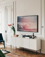 Lost Coast Waves Pink III by Nathan Larson. shown as a framed stretched canvas in a living room above a console. Available as a archival giclee rolled canvas, fine art paper, or poster print. SKU 87262i.