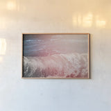 Lost Coast Waves Pink IV by Nathan Larson. shown as a paper print in a natural frame. Available as a archival giclee rolled canvas, fine art paper, or poster print. SKU 87263i.