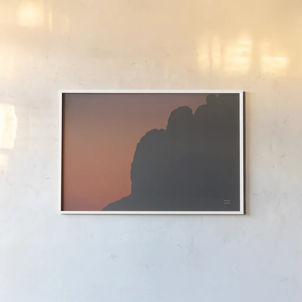Make Me Your Sunset III by Nathan Larson. shown as a paper print in a white frame. Available as a archival giclee rolled canvas, fine art paper, or poster print. SKU 82423i.