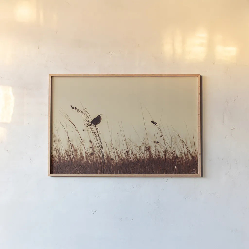 Meadowlark Call Antique by Nathan Larson. shown as a paper print in a natural frame. Available as a archival giclee rolled canvas, fine art paper, or poster print. SKU 98337i.