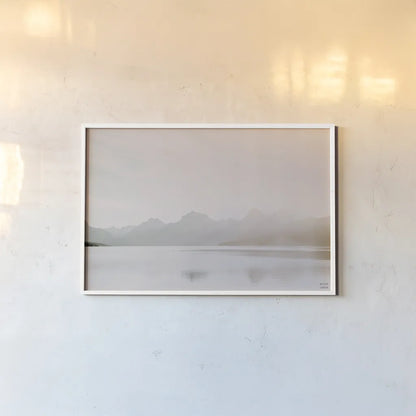 Montana Light by Nathan Larson. shown as a paper print in a white frame. Available as a archival giclee rolled canvas, fine art paper, or poster print. SKU 98328i.