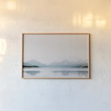 Montana Light II by Nathan Larson. shown as a paper print in a natural frame. Available as a archival giclee rolled canvas, fine art paper, or poster print. SKU 98332i.