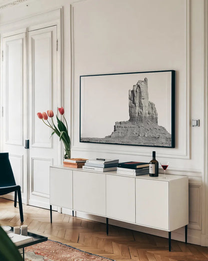 Monument Valley I by Nathan Larson. shown as a framed stretched canvas in a living room above a console. Available as a archival giclee rolled canvas, fine art paper, or poster print. SKU 86708i.