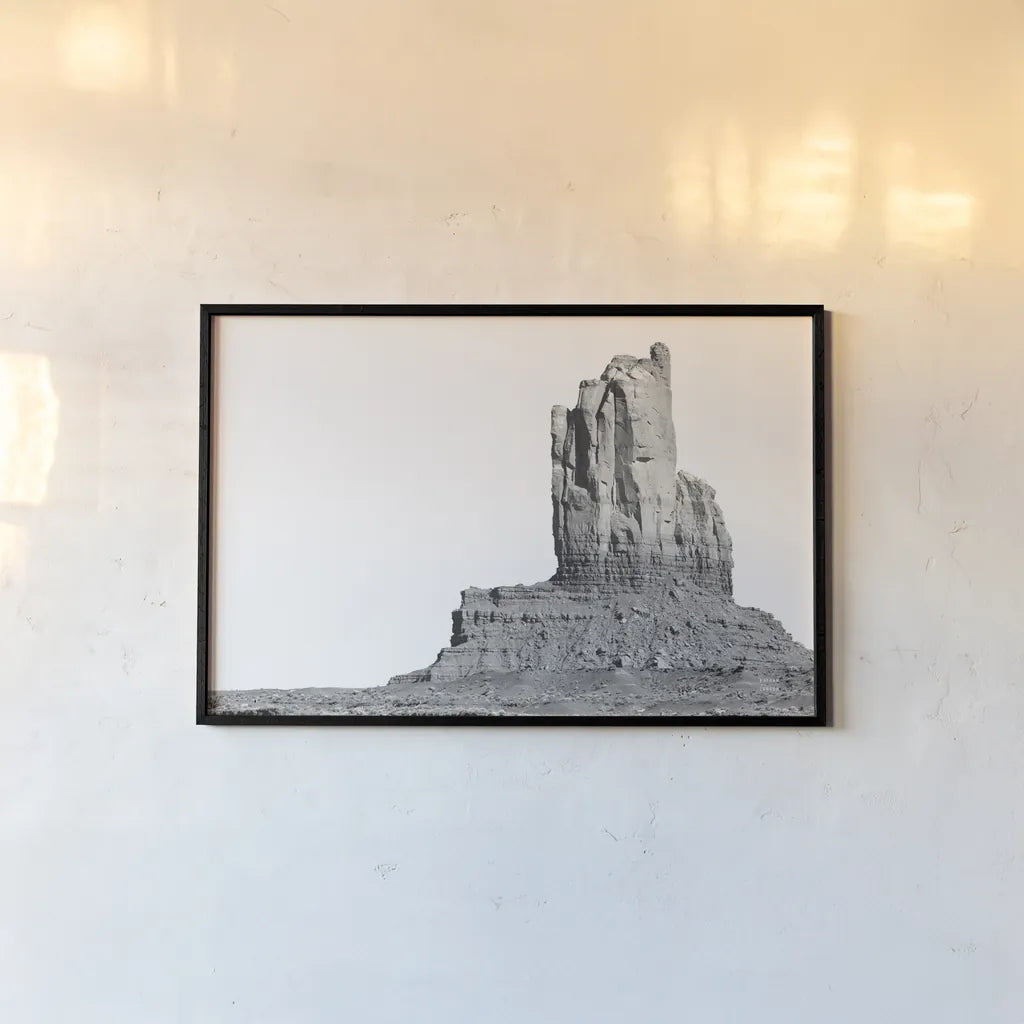 Monument Valley I by Nathan Larson. shown as a paper print in a black flame. Available as a archival giclee rolled canvas, fine art paper, or poster print. SKU 86708i.