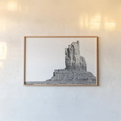 Monument Valley I by Nathan Larson. shown as a paper print in a natural frame. Available as a archival giclee rolled canvas, fine art paper, or poster print. SKU 86708i.