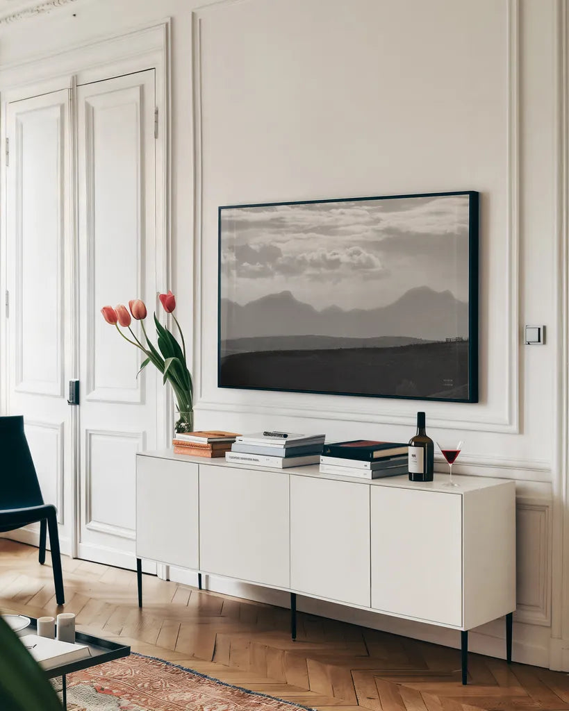 Mountain Layers by Nathan Larson. shown as a framed stretched canvas in a living room above a console. Available as a archival giclee rolled canvas, fine art paper, or poster print. SKU 81197i.