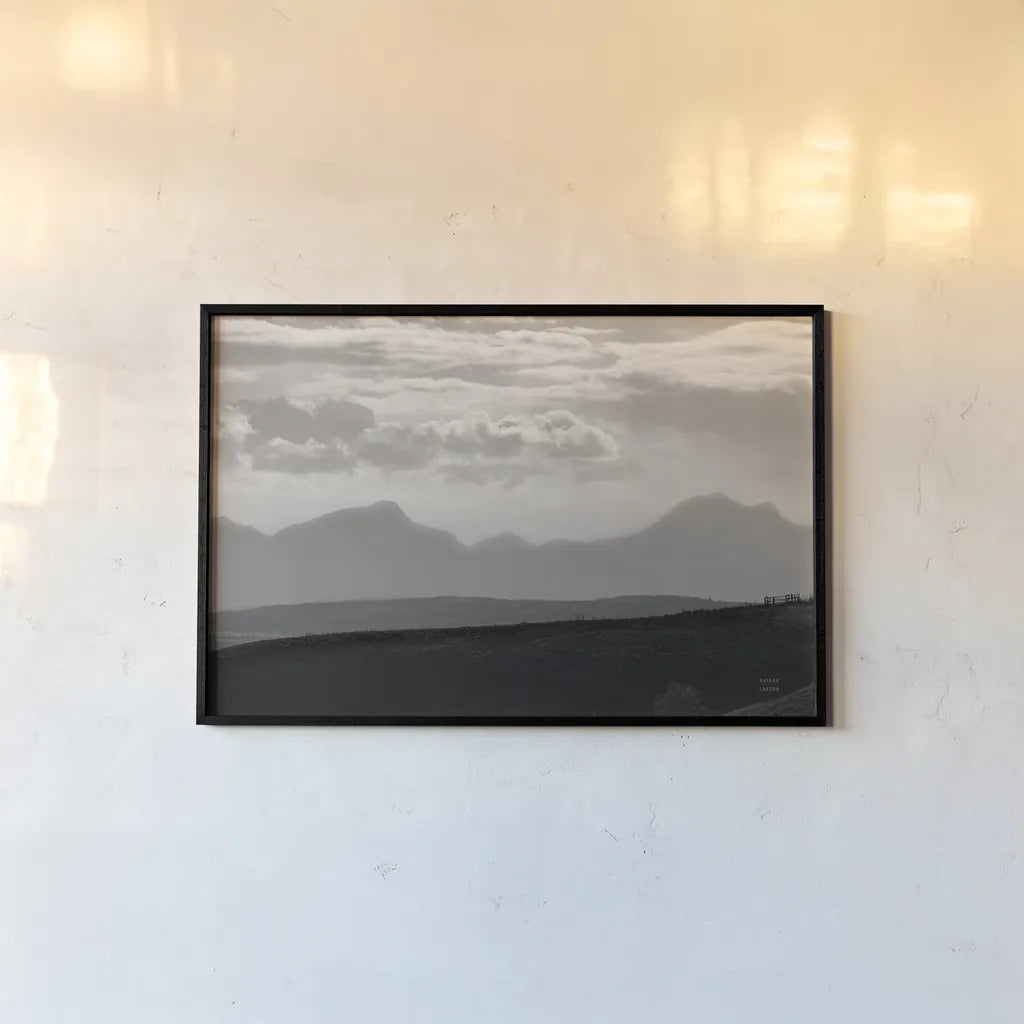 Mountain Layers by Nathan Larson. shown as a paper print in a black flame. Available as a archival giclee rolled canvas, fine art paper, or poster print. SKU 81197i.