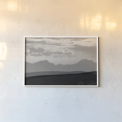 Mountain Layers by Nathan Larson. shown as a paper print in a white frame. Available as a archival giclee rolled canvas, fine art paper, or poster print. SKU 81197i.