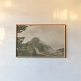Mountain Memories by Nathan Larson. shown as a paper print in a natural frame. Available as a archival giclee rolled canvas, fine art paper, or poster print. SKU 87638i.