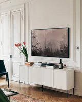 Mystery Wood I by Nathan Larson. shown as a framed stretched canvas in a living room above a console. Available as a archival giclee rolled canvas, fine art paper, or poster print. SKU 99777i.