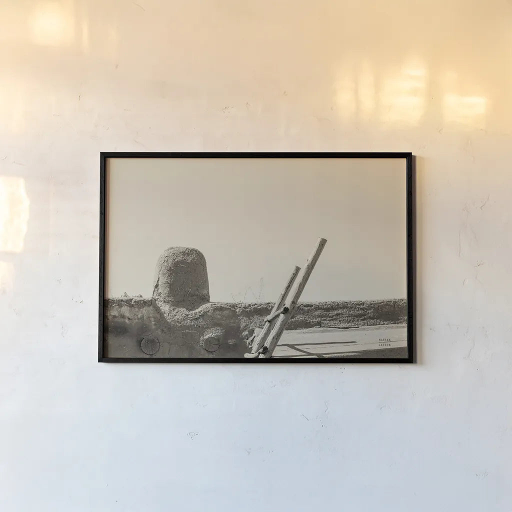 New Mexico Adobe by Nathan Larson. shown as a paper print in a black flame. Available as a archival giclee rolled canvas, fine art paper, or poster print. SKU 81818i.