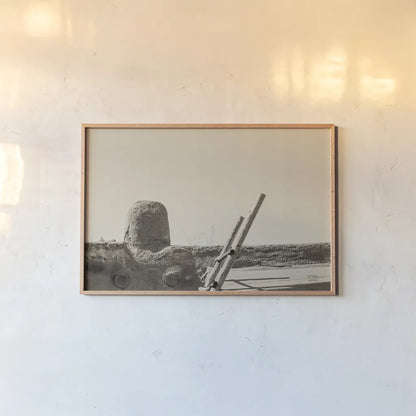 New Mexico Adobe by Nathan Larson. shown as a paper print in a natural frame. Available as a archival giclee rolled canvas, fine art paper, or poster print. SKU 81818i.