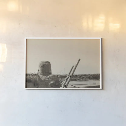 New Mexico Adobe by Nathan Larson. shown as a paper print in a white frame. Available as a archival giclee rolled canvas, fine art paper, or poster print. SKU 81818i.