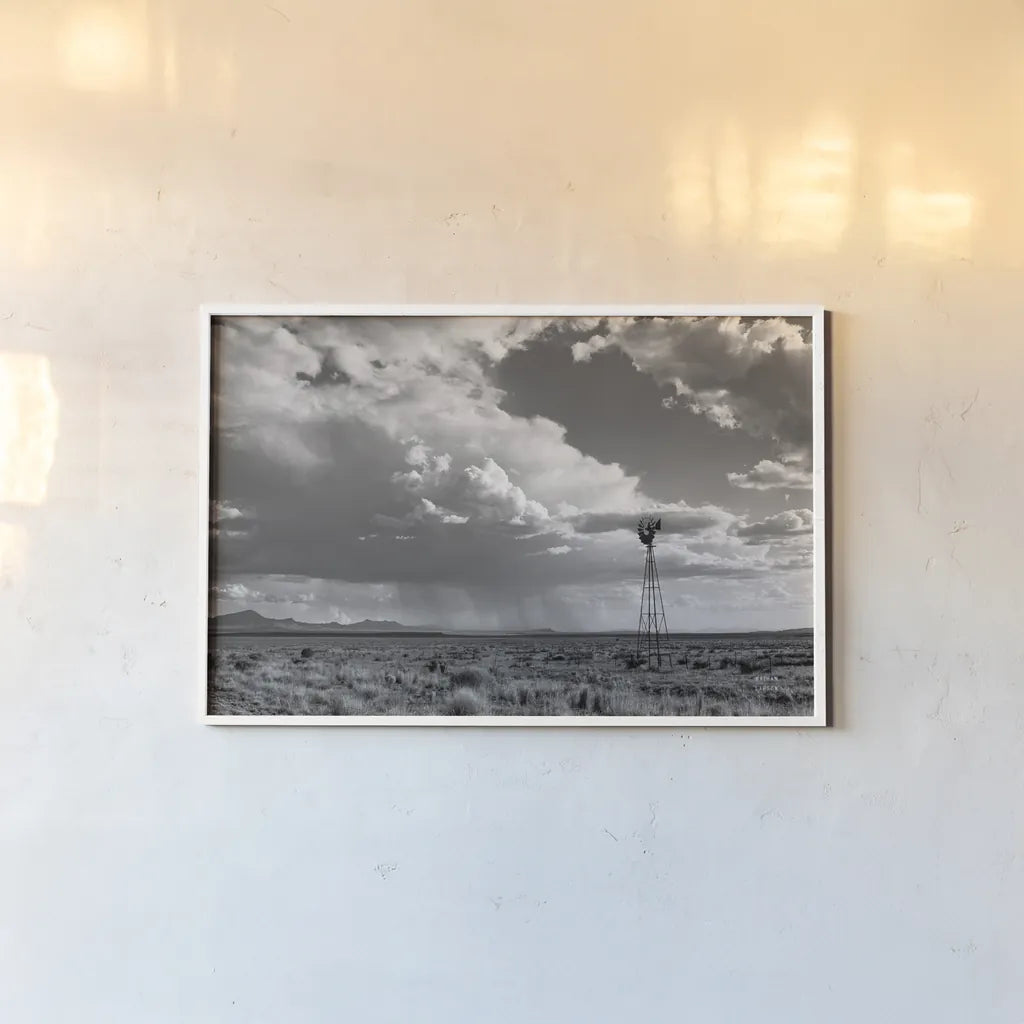 New Mexico Monsoon Rains by Nathan Larson. shown as a paper print in a white frame. Available as a archival giclee rolled canvas, fine art paper, or poster print. SKU 82305i.