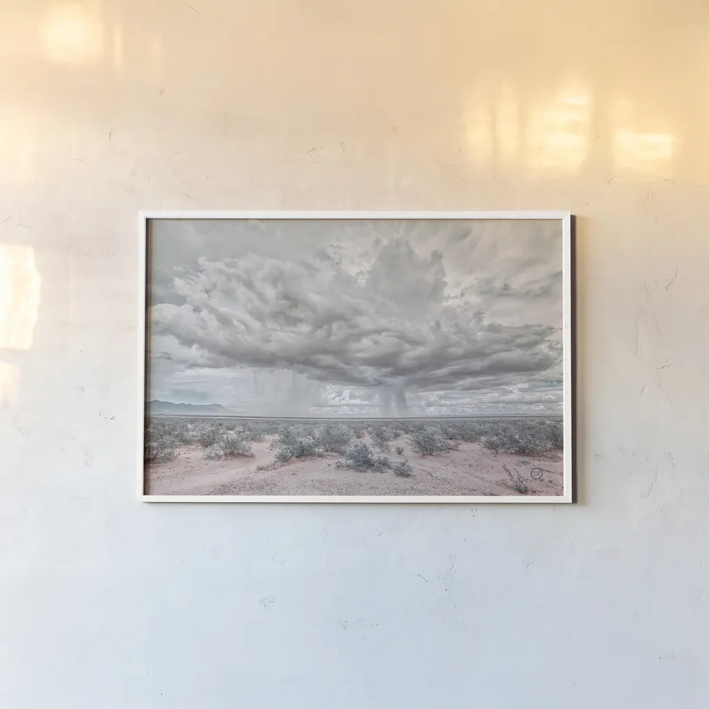 New Mexico Rain by Nathan Larson. shown as a paper print in a white frame. Available as a archival giclee rolled canvas, fine art paper, or poster print. SKU 72033i.