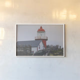 Newfoundland Foggy Morning by Nathan Larson. shown as a paper print in a white frame. Available as a archival giclee rolled canvas, fine art paper, or poster print. SKU 100496i.
