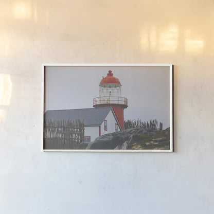 Newfoundland Foggy Morning by Nathan Larson. shown as a paper print in a white frame. Available as a archival giclee rolled canvas, fine art paper, or poster print. SKU 100496i.