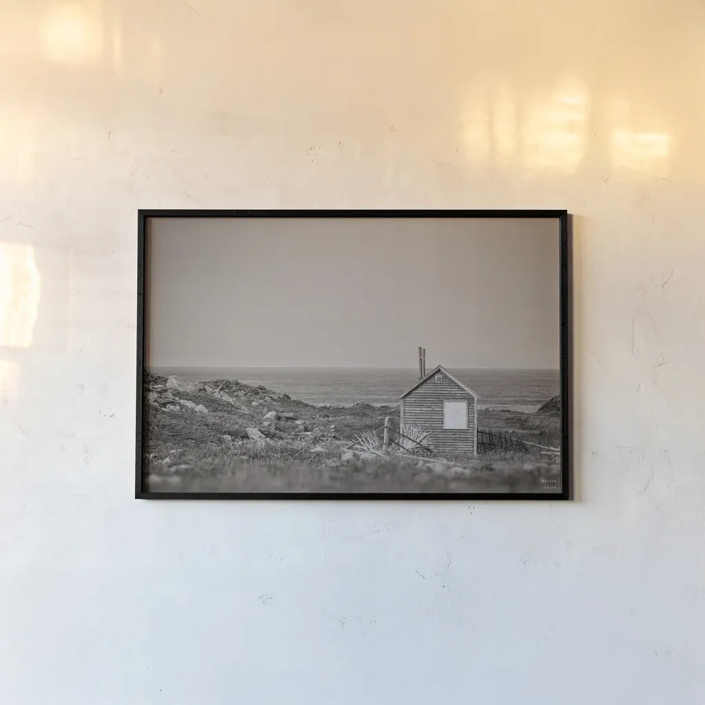 Newfoundland Historic Buildings Sepia by Nathan Larson. shown as a paper print in a black flame. Available as a archival giclee rolled canvas, fine art paper, or poster print. SKU 101668i.
