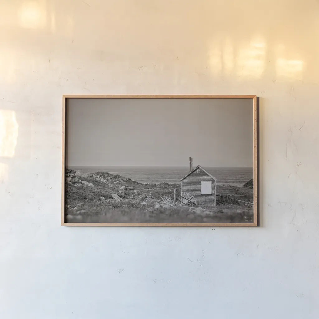 Newfoundland Historic Buildings Sepia by Nathan Larson. shown as a paper print in a natural frame. Available as a archival giclee rolled canvas, fine art paper, or poster print. SKU 101668i.